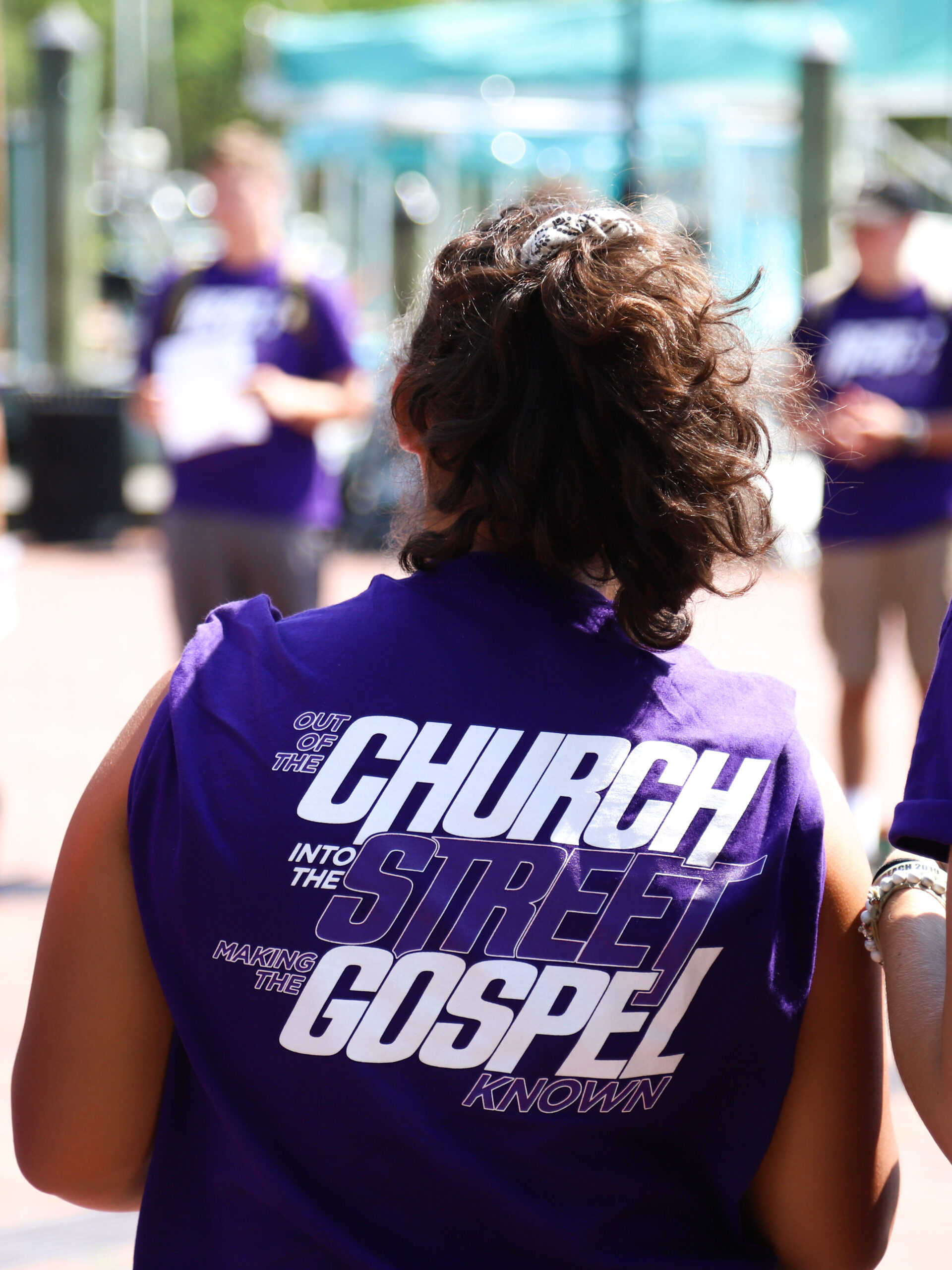 Back of REACH shirt: Out of the church. Into the street. Making the gospel known.